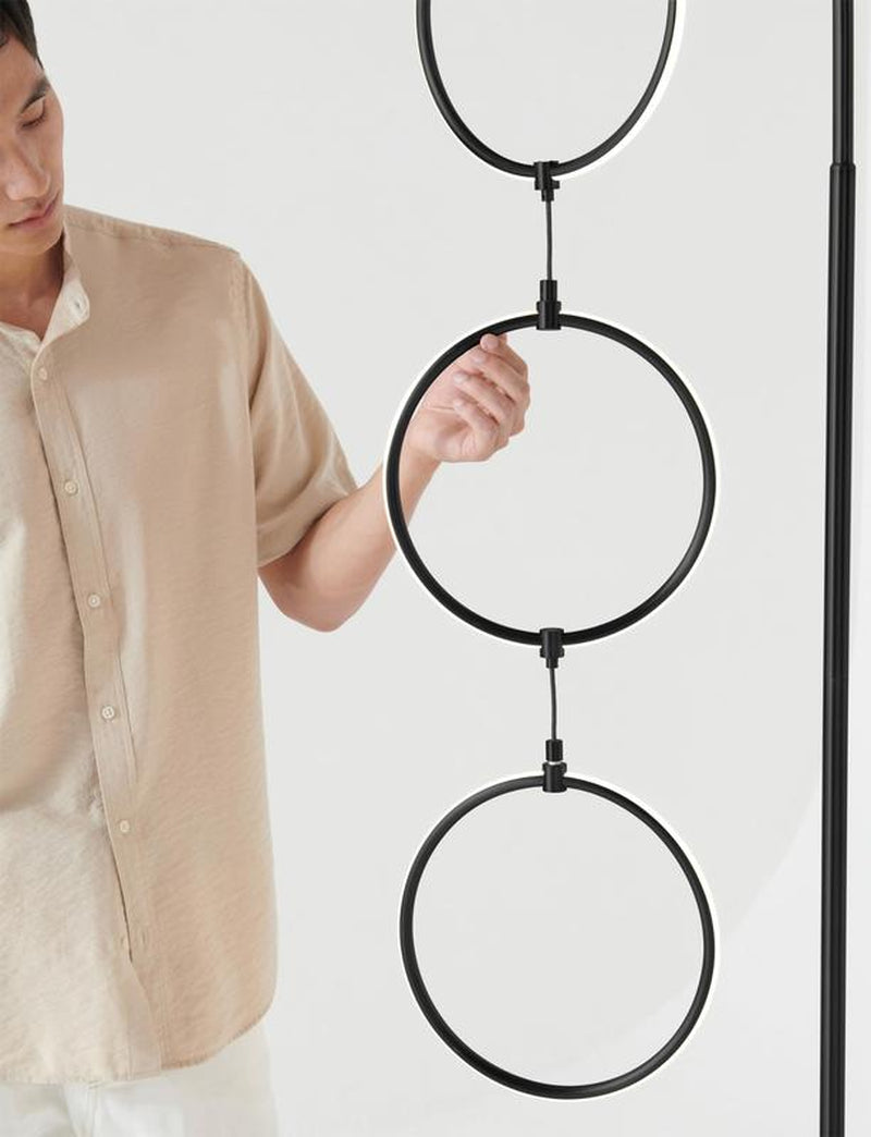 Brightech Nova Modern Floor Lamp Matches Living Room Décor - Contemporary Arc Tall Lamp with 3-Circle Ring-Style Pendant - over the Couch Standing on Arching Pole