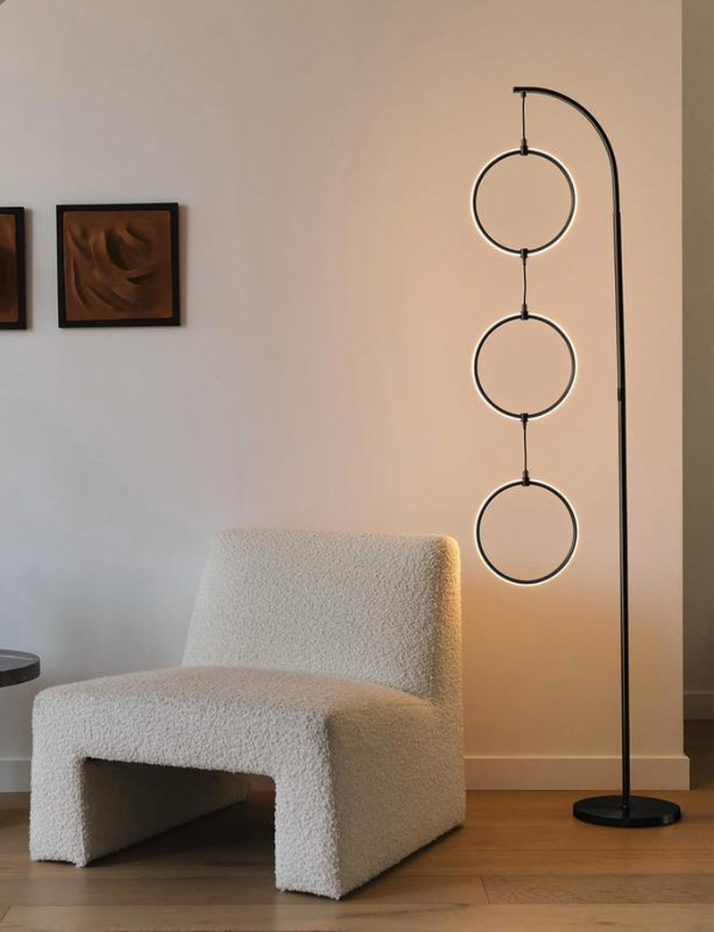 Brightech Nova Modern Floor Lamp Matches Living Room Décor - Contemporary Arc Tall Lamp with 3-Circle Ring-Style Pendant - over the Couch Standing on Arching Pole
